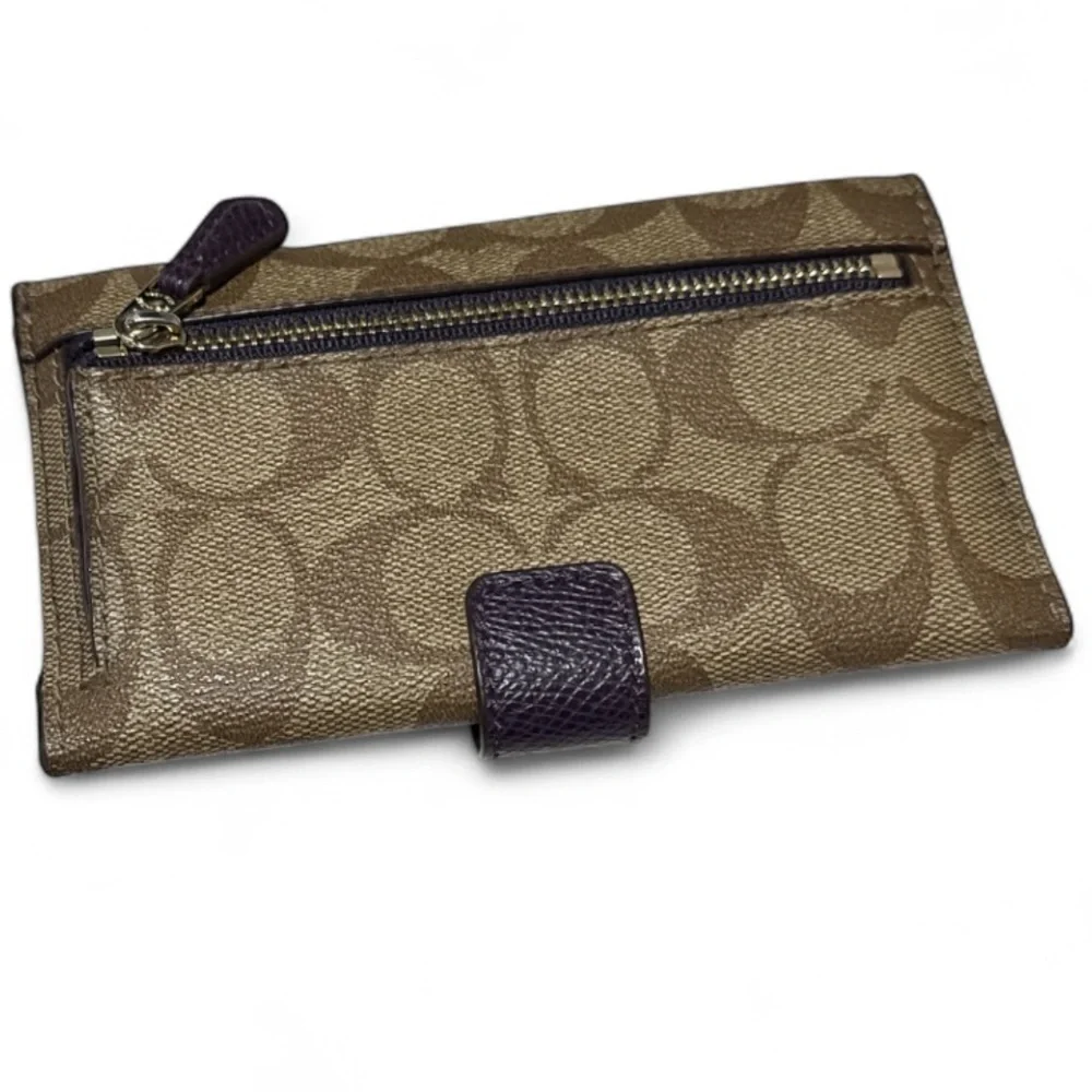 Coach wristlet wallet tan purple signature C leather